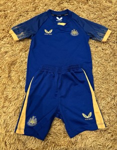 Castore Newcastle United Away Full Kit Blue Short Sleeve Kids 3-4 Years for sale on Ebay