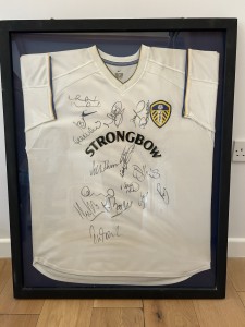 Framed Leeds United Signed Home Shirt with certificate of authenticity  for sale on Ebay