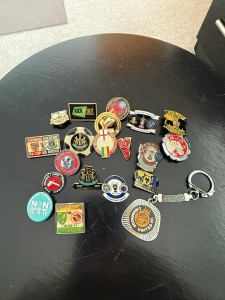 A collection of mainly football badges for sale on Ebay