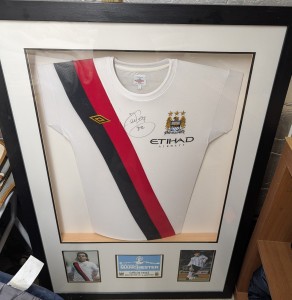 framed Manchester City 2009-2010  featuring a signature  Carlos Tevez, for sale on Ebay
