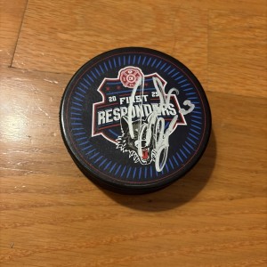 Carolina Hurricanes Mystery Puck Josiah Slavin Chicago Wolves First Responders for sale on Ebay