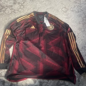 official Adidas Germany away jersey from the 2022 World Cup for sale on Ebay