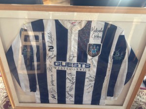 This looks like a West Bromwich Albion home shirt (with the “Guests West Bromwic for sale on Ebay