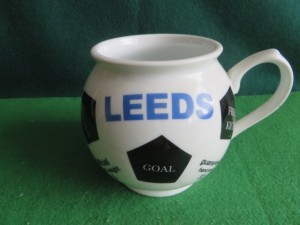 LEEDS UNITED  FOOTBALL SHAPED CUP/MUG IN VGC for sale on Ebay