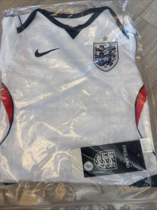 England 26/27  Football Shirt.  9 Month Old Baby Grow White. for sale on Ebay