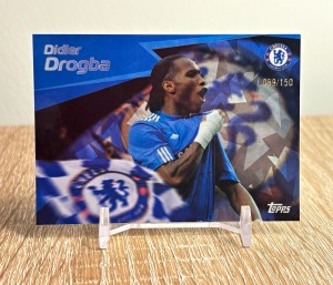 Didier Drogba /150 Waving Flag Blue Icy Foil - Topps Chelsea Team Set 25-26 for sale on Ebay